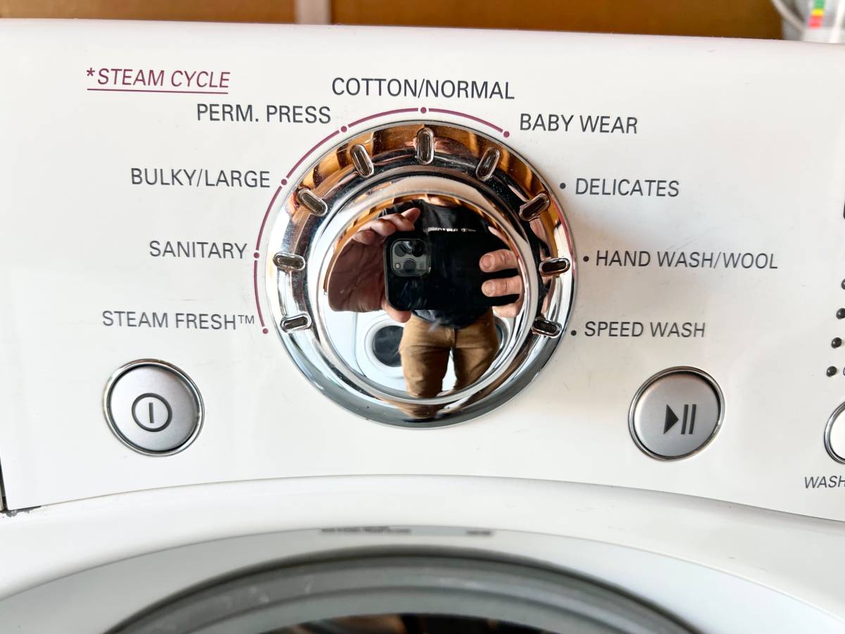 27 INCH LG WM2487HWM TROMM Front Load Washer 4.0 cu. ft. White , Used Condition , 1200 RPM . Direct Drive , Ultra Capacity , Never Rust Stainless Drum , HE , Roller Jets , 9 Washing Programs, 5 Temp Level,Remote Monitor,Stackable,LED,Chrome Rimmer Door