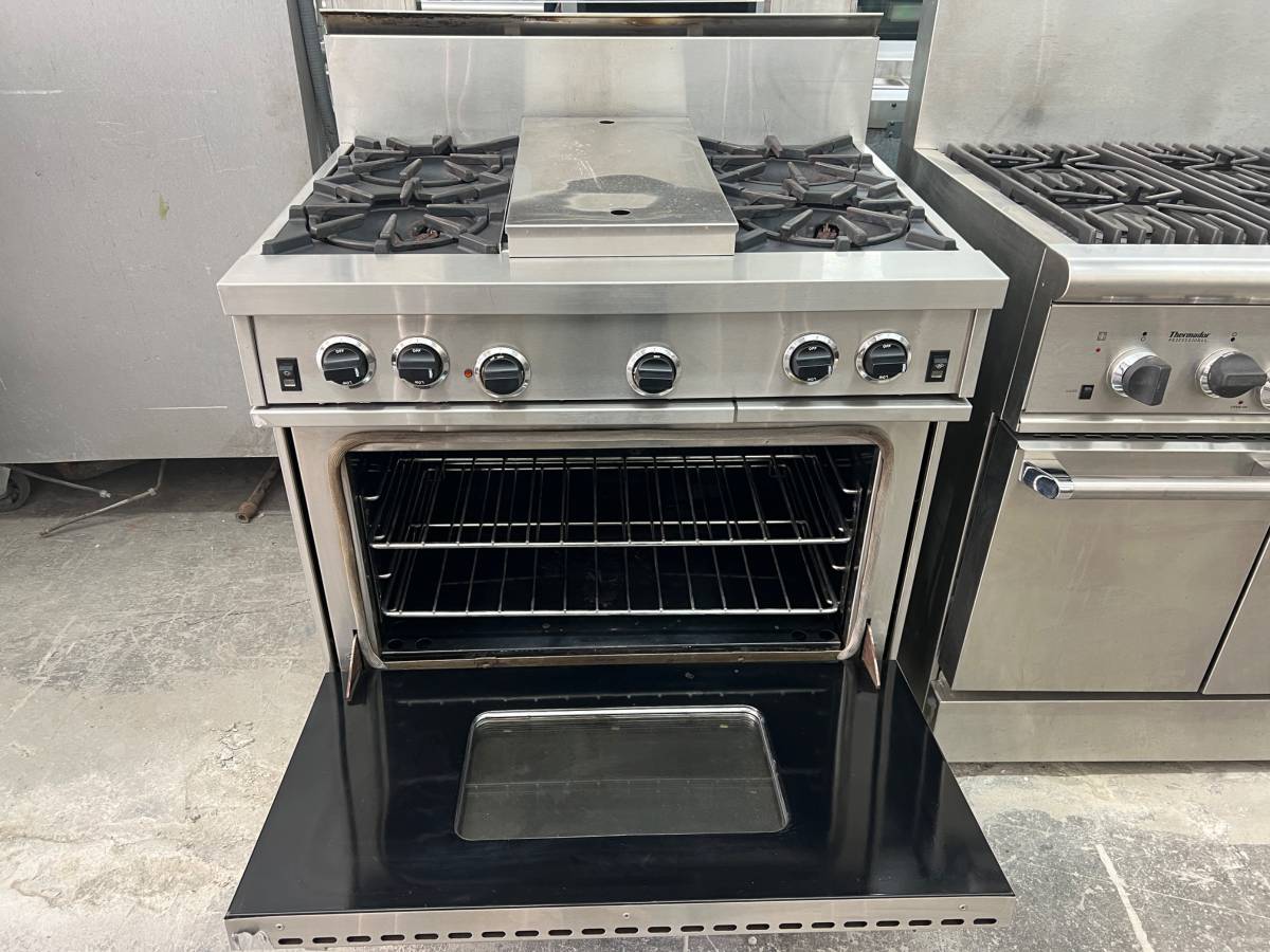 36 INCH Garland Gas Range, 4 Burner with Griddle ,Convection Oven, Stainless Steel , Used Condition ,