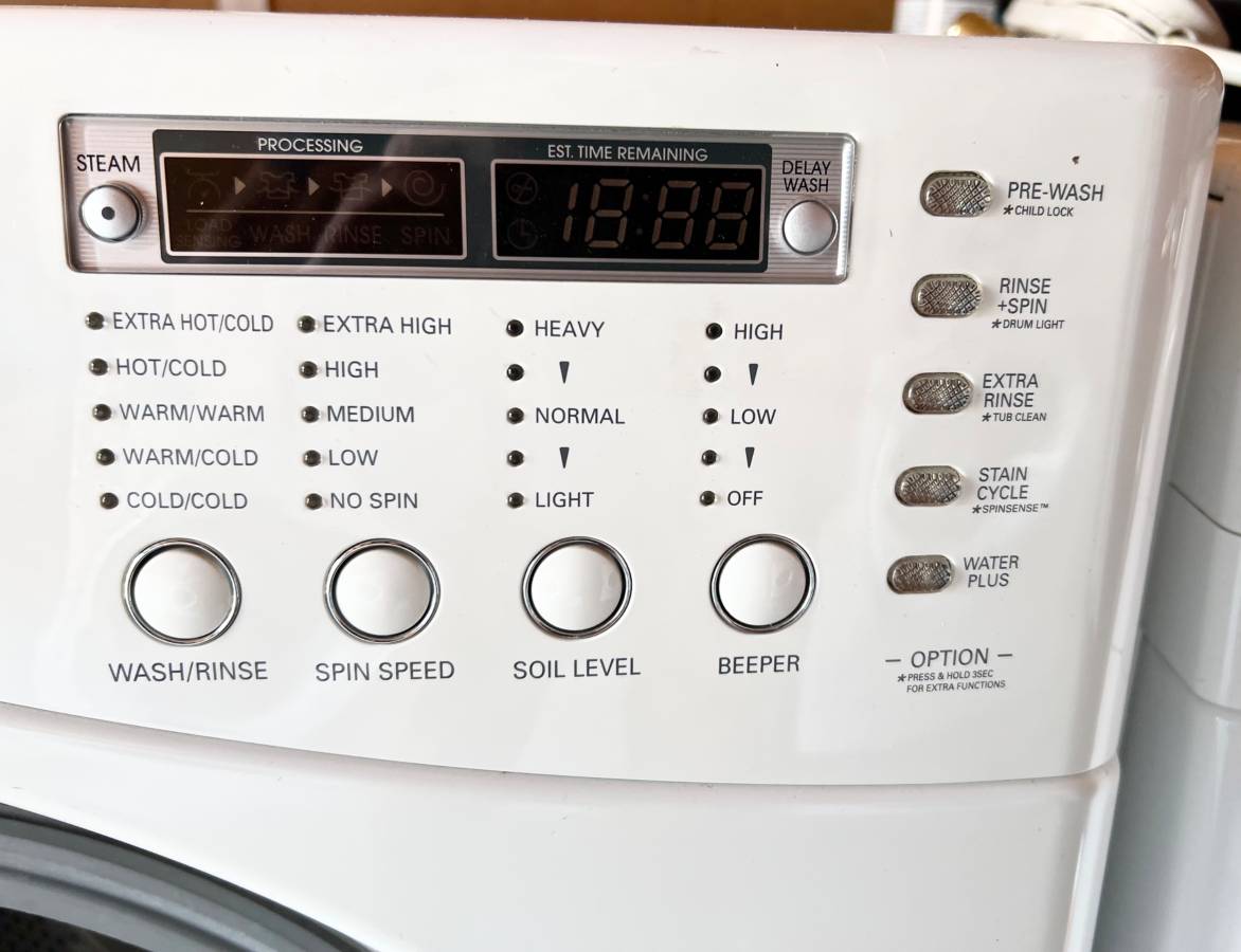 27 INCH LG WM2487HWM TROMM Front Load Washer 4.0 cu. ft. White , Used Condition , 1200 RPM . Direct Drive , Ultra Capacity , Never Rust Stainless Drum , HE , Roller Jets , 9 Washing Programs, 5 Temp Level,Remote Monitor,Stackable,LED,Chrome Rimmer Door
