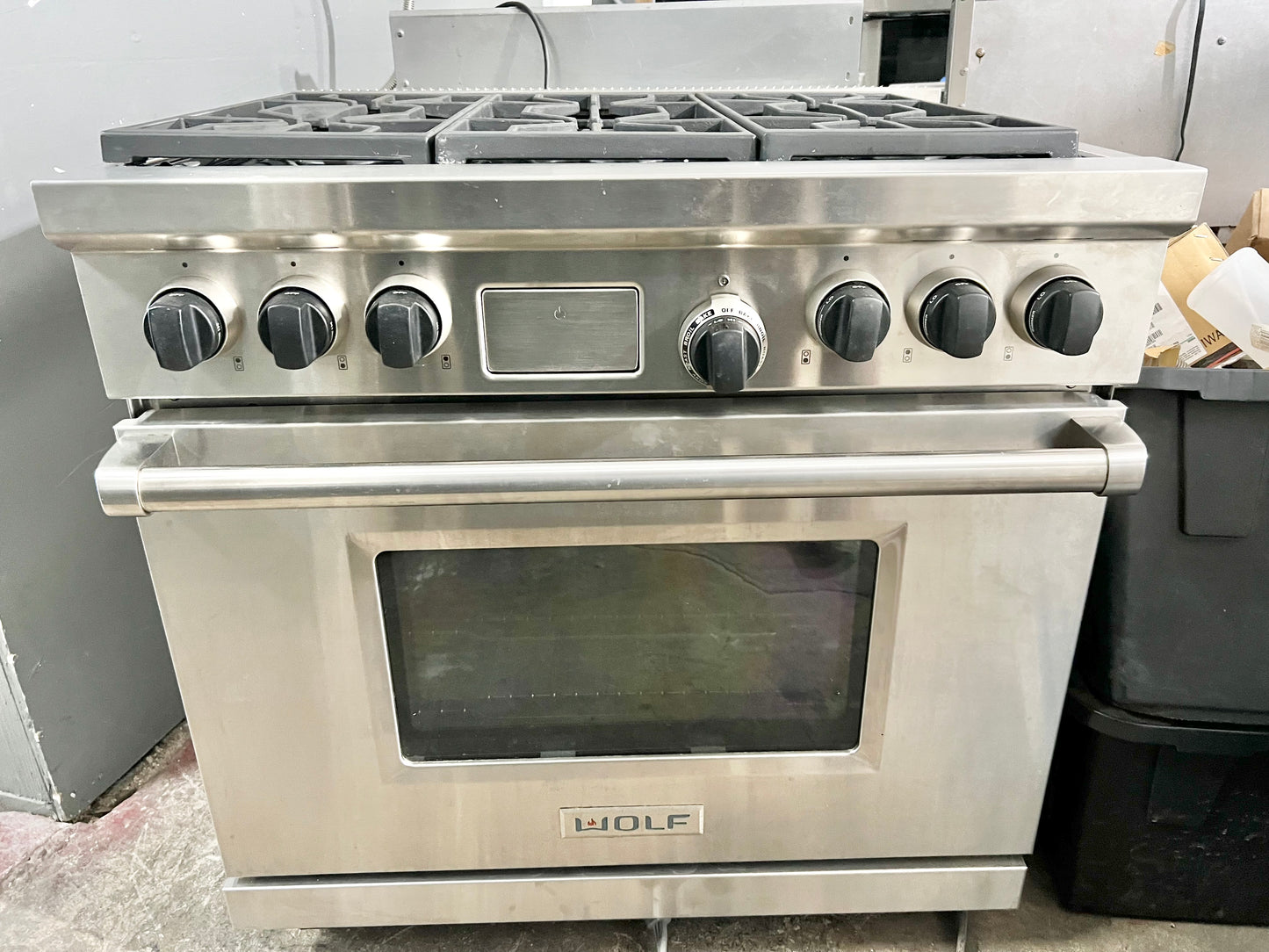 36 INCH WOLF  Professional Style Dual Fuel Gas Range 5.4 cu. ft. Dual Convection Oven, 6 Dual-Stacked Sealed Burners,Temperature Probe, Continuous Grates,  Natural Gas , Stainless Steel, Used Condition .