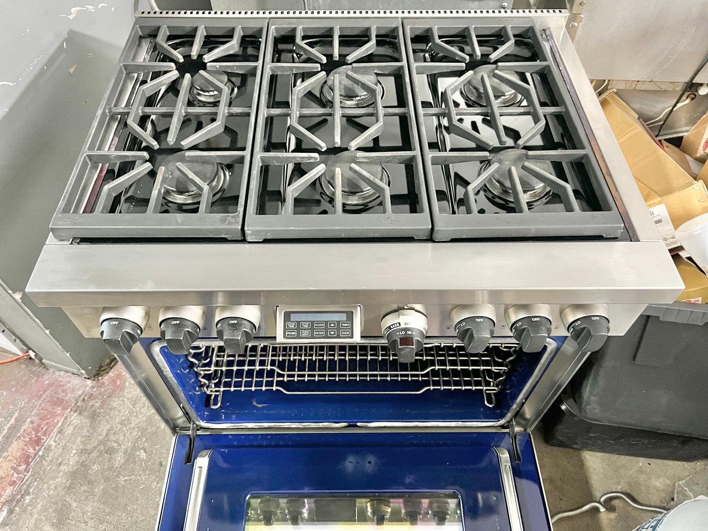 36 INCH WOLF  Professional Style Dual Fuel Gas Range 5.4 cu. ft. Dual Convection Oven, 6 Dual-Stacked Sealed Burners,Temperature Probe, Continuous Grates,  Natural Gas , Stainless Steel, Used Condition .