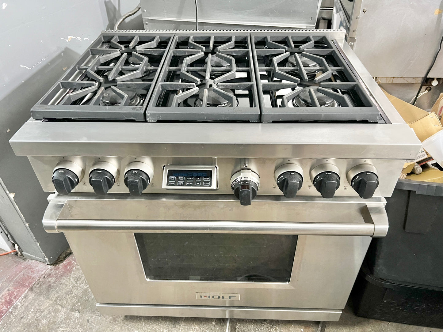 36 INCH WOLF  Professional Style Dual Fuel Gas Range 5.4 cu. ft. Dual Convection Oven, 6 Dual-Stacked Sealed Burners,Temperature Probe, Continuous Grates,  Natural Gas , Stainless Steel, Used Condition .