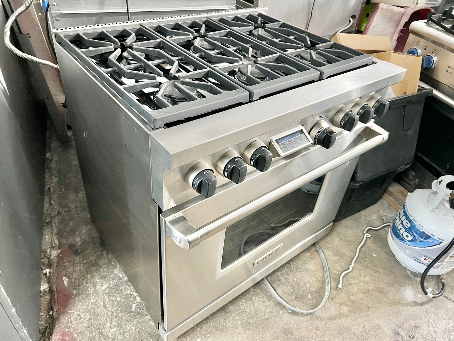 36 INCH WOLF  Professional Style Dual Fuel Gas Range 5.4 cu. ft. Dual Convection Oven, 6 Dual-Stacked Sealed Burners,Temperature Probe, Continuous Grates,  Natural Gas , Stainless Steel, Used Condition .