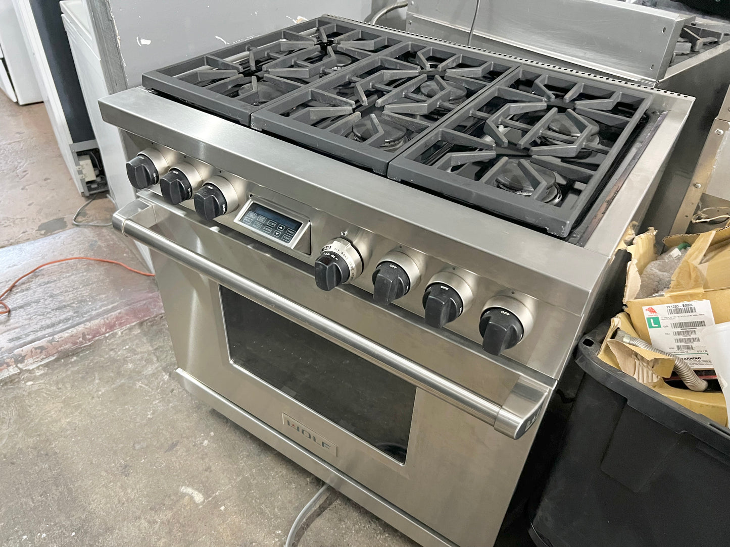 36 INCH WOLF  Professional Style Dual Fuel Gas Range 5.4 cu. ft. Dual Convection Oven, 6 Dual-Stacked Sealed Burners,Temperature Probe, Continuous Grates,  Natural Gas , Stainless Steel, Used Condition .