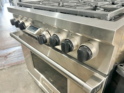 36 INCH WOLF  Professional Style Dual Fuel Gas Range 5.4 cu. ft. Dual Convection Oven, 6 Dual-Stacked Sealed Burners,Temperature Probe, Continuous Grates,  Natural Gas , Stainless Steel, Used Condition .
